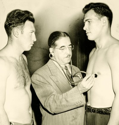Medical check-up before a boxing match, c. 1930 by American Photographer